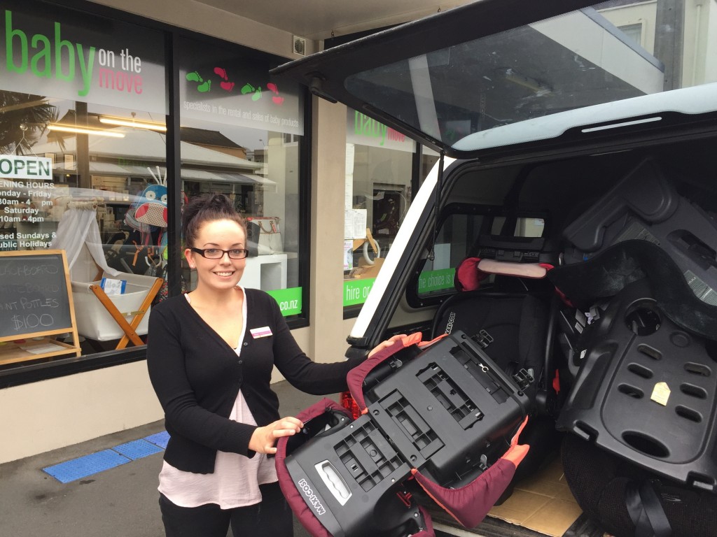 Hannah Fabish at Baby on the Move Lower Hutt with seats brought in for recycling.