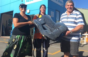 Waimakariri District Council Solid Waste Asset Manager Kitty Waghorn, left, Southbrook Resource Recovery Park site manager Sonya Mercer and Councillor Robbie Brine with the first child car seat to go for recycling. PHOTO: WAIMAKARIRI DISTRICT COUNCIL